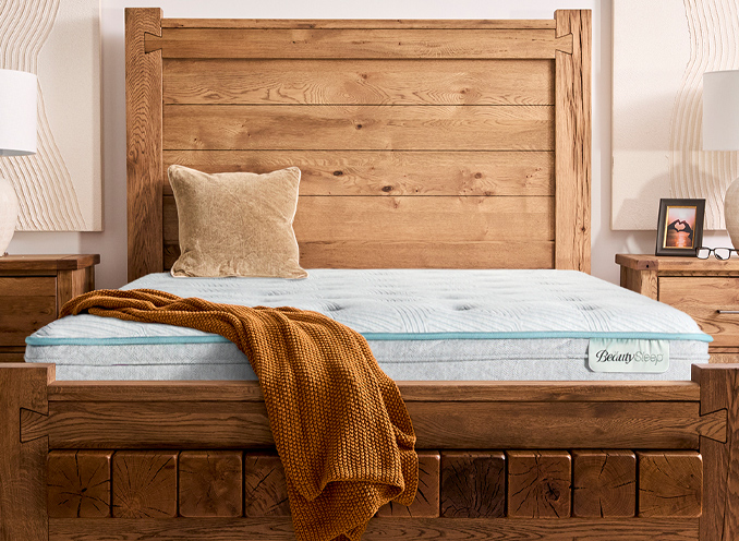 A wooden mattress with a sturdy wooden frame, showcasing natural materials and craftsmanship in a minimalist design.