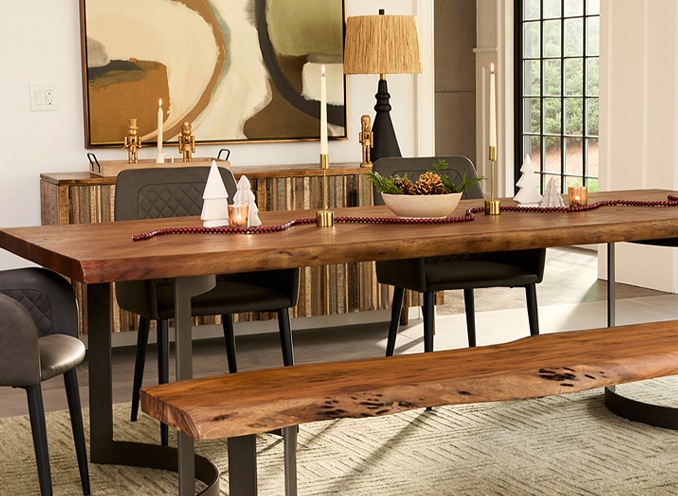 A dining table surrounded by a bench and chairs, creating a cozy and inviting dining space.