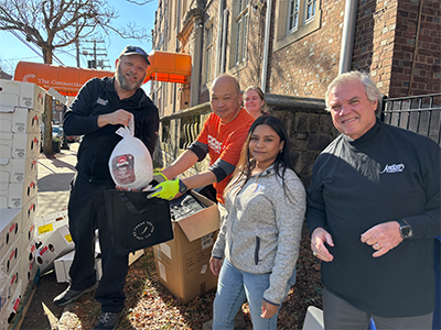 Employees and volunteers working together