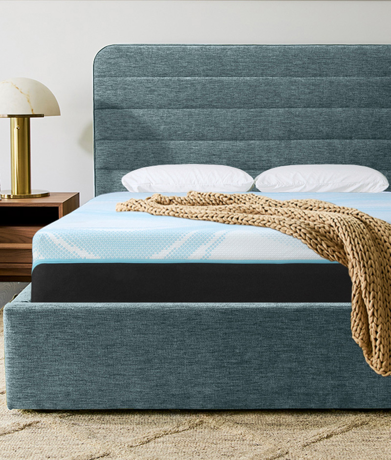 A stylish mattress with a blue headboard and a black footboard, combining elegance and contemporary aesthetics.