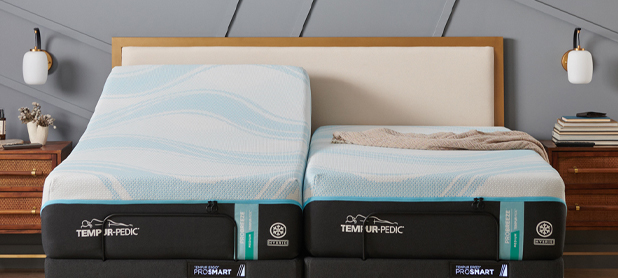 Tempur-Pedic mattress displayed with two adjustable bases, showcasing comfort and customizable support for restful sleep.